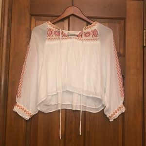 Very cute white blouse, with a patterned accent.